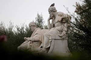 Marble statues of Plato and Socrates in Athens